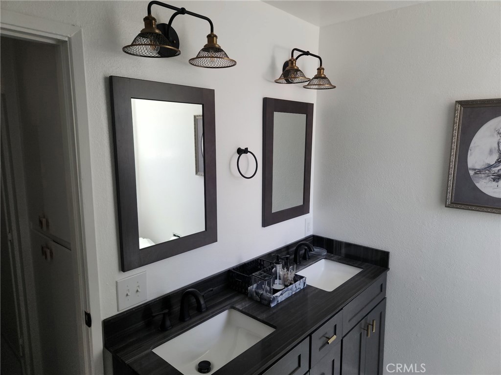 25935 Ranger Drive Twin Peaks, CA 92391 - Photo 17 of 30 a bathroom with a sink and a mirror