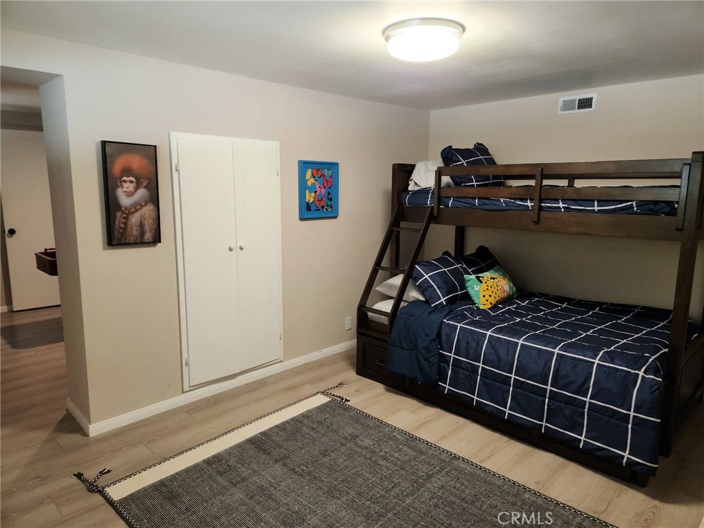25935 Ranger Drive Twin Peaks, CA 92391 - Photo 19 of 30 a bed room with a bed and a window