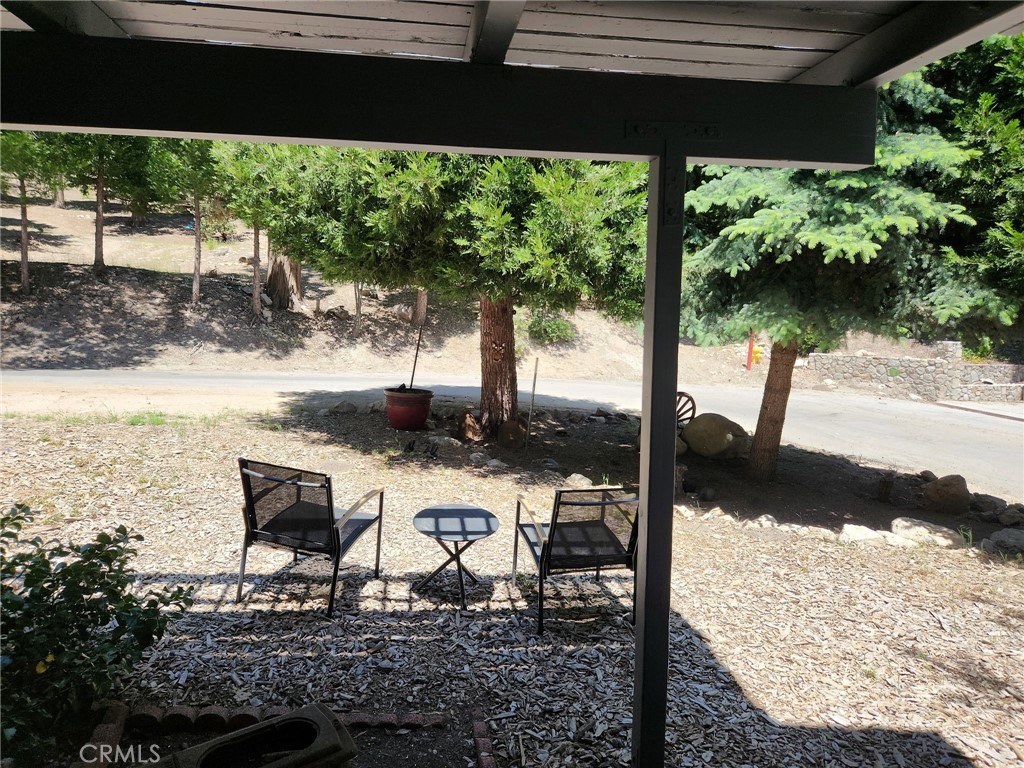 25935 Ranger Drive Twin Peaks, CA 92391 - Photo 30 of 30 a view of yard from deck with patio