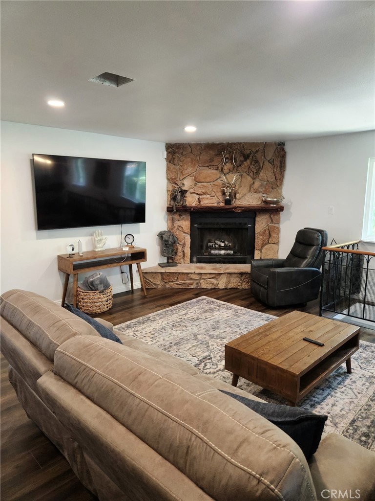 25935 Ranger Drive Twin Peaks, CA 92391 - Photo 5 of 30 a living room with furniture and a flat screen tv
