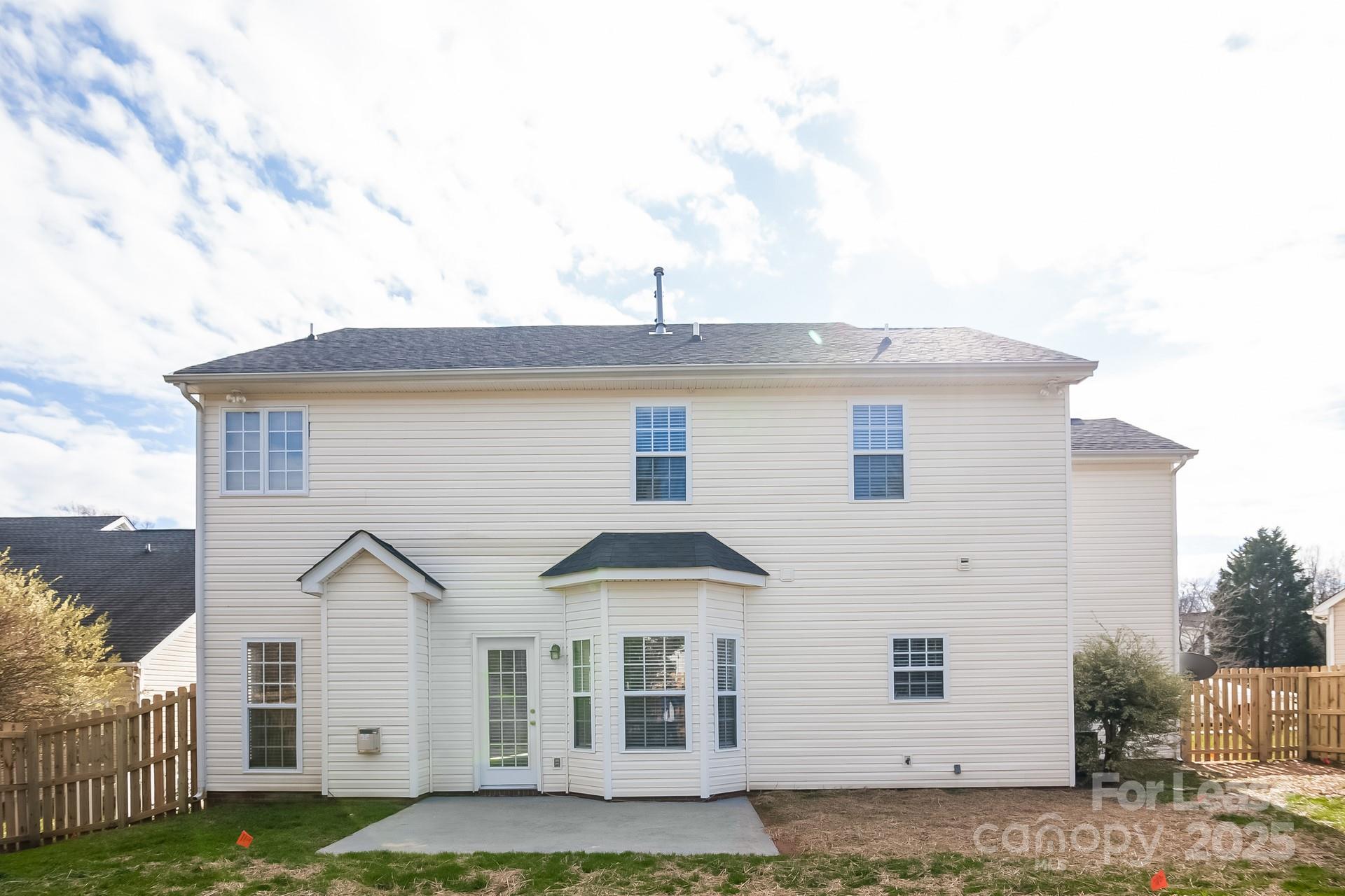 10209 Fairbourne Court Charlotte, NC 28269 - Photo 15 of 15 a front view of a house with a yard