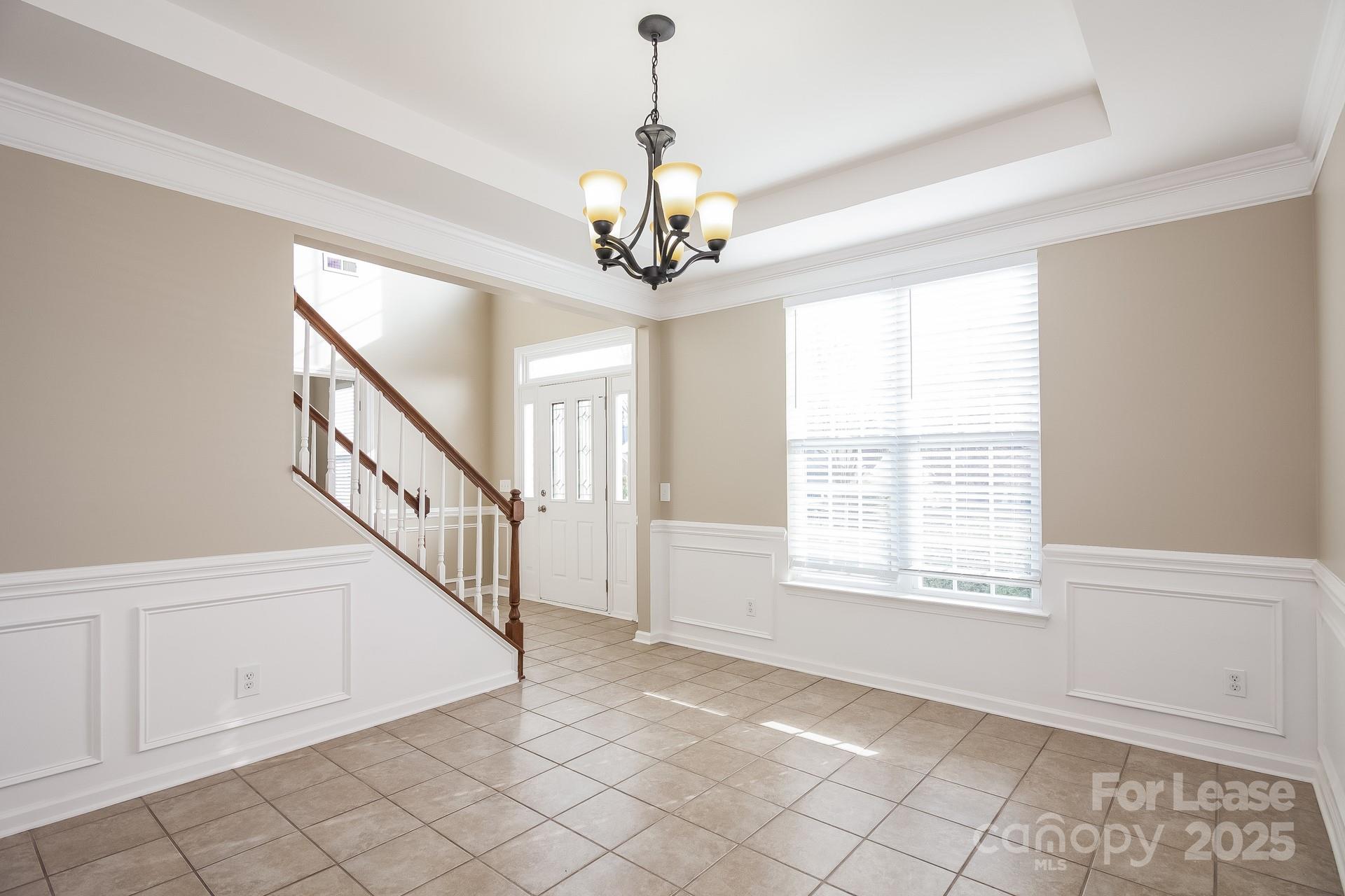 10209 Fairbourne Court Charlotte, NC 28269 - Photo 3 of 15 a view of an empty room with window