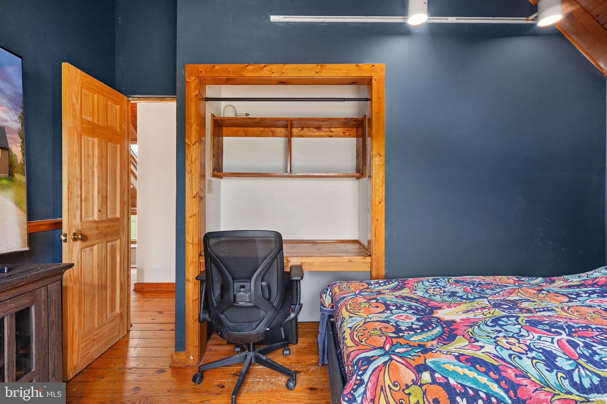 6119 Beach Road Midland, VA 22728 - Photo 50 of 98 a bedroom with a bed and a window