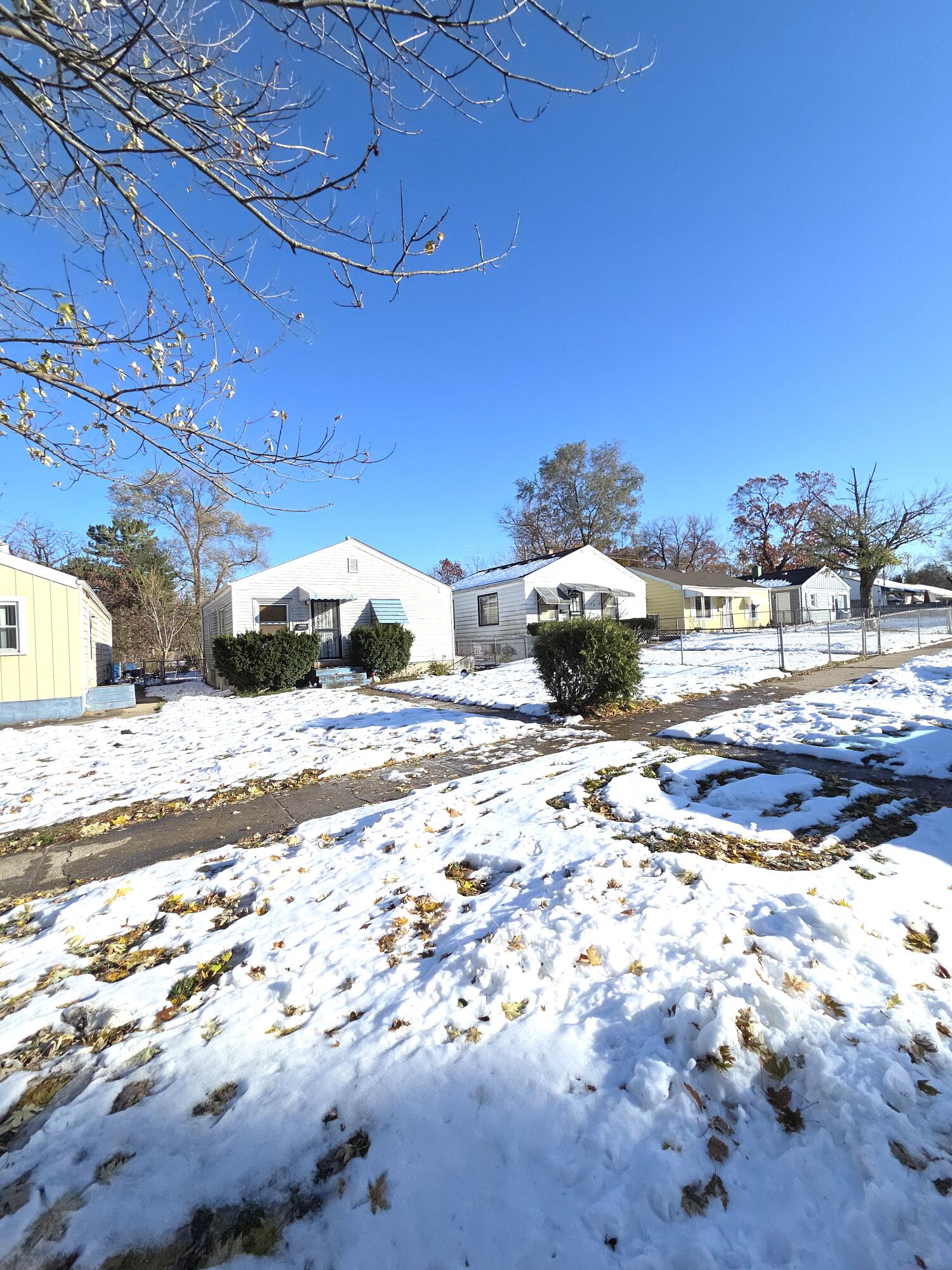 4115 Fillmore Street Gary, IN 46408 - Photo 16 of 16 a view of a backyard of a house with a yard
