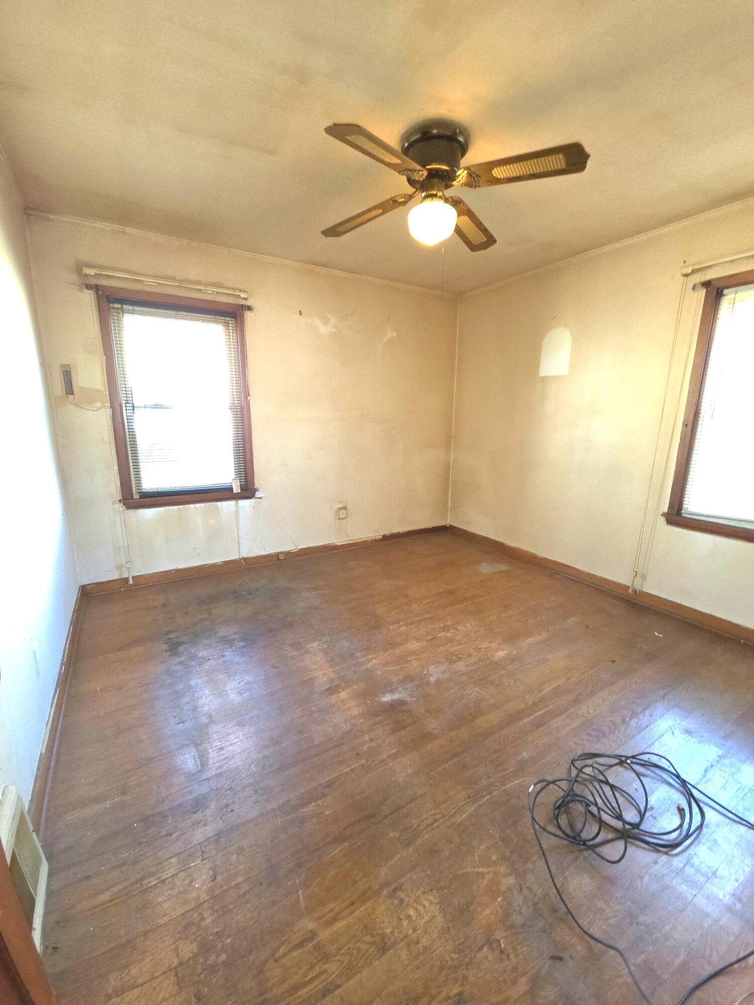 4115 Fillmore Street Gary, IN 46408 - Photo 4 of 16 wooden floor in a room with a window