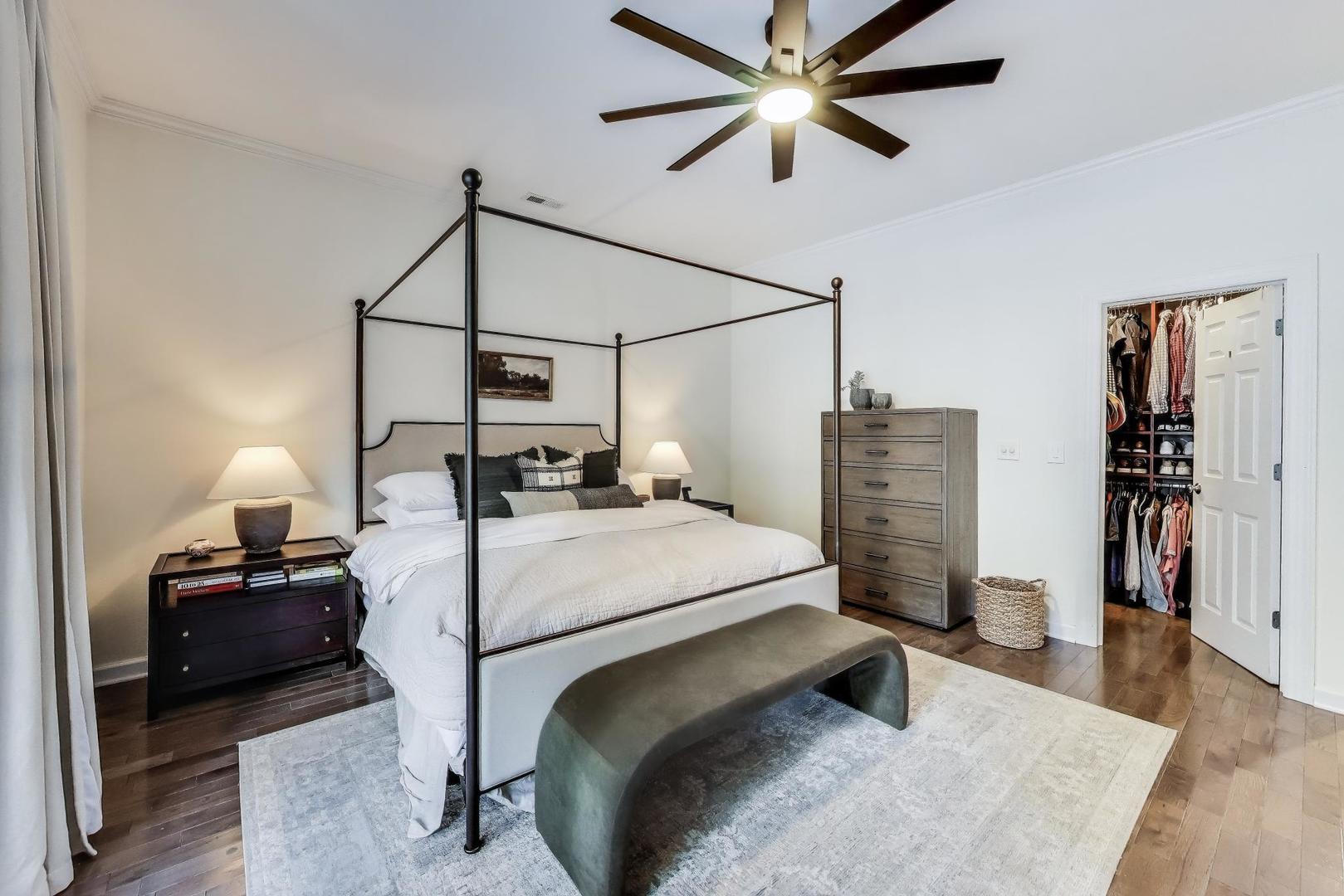 1533 North Cleveland Avenue, Unit 1S Chicago, IL 60610 - Photo 14 of 36 a bedroom with a bed and a chandelier