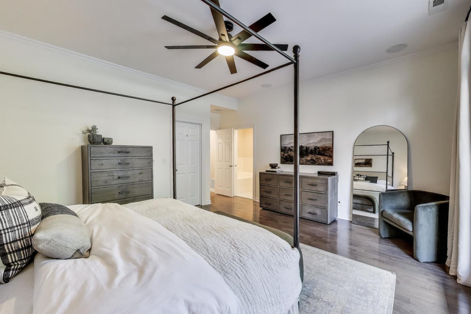 1533 North Cleveland Avenue, Unit 1S Chicago, IL 60610 - Photo 15 of 36 a bedroom with a bed and a dresser