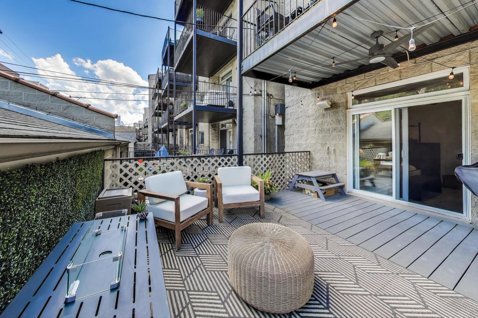 1533 North Cleveland Avenue, Unit 1S Chicago, IL 60610 - Photo 20 of 36 a outdoor space with patio lots of furniture