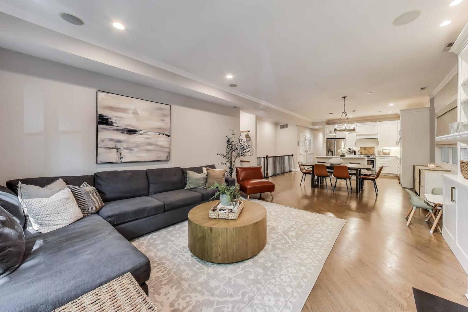 1533 North Cleveland Avenue, Unit 1S Chicago, IL 60610 - Photo 2 of 36 a living room with furniture and view of kitchen