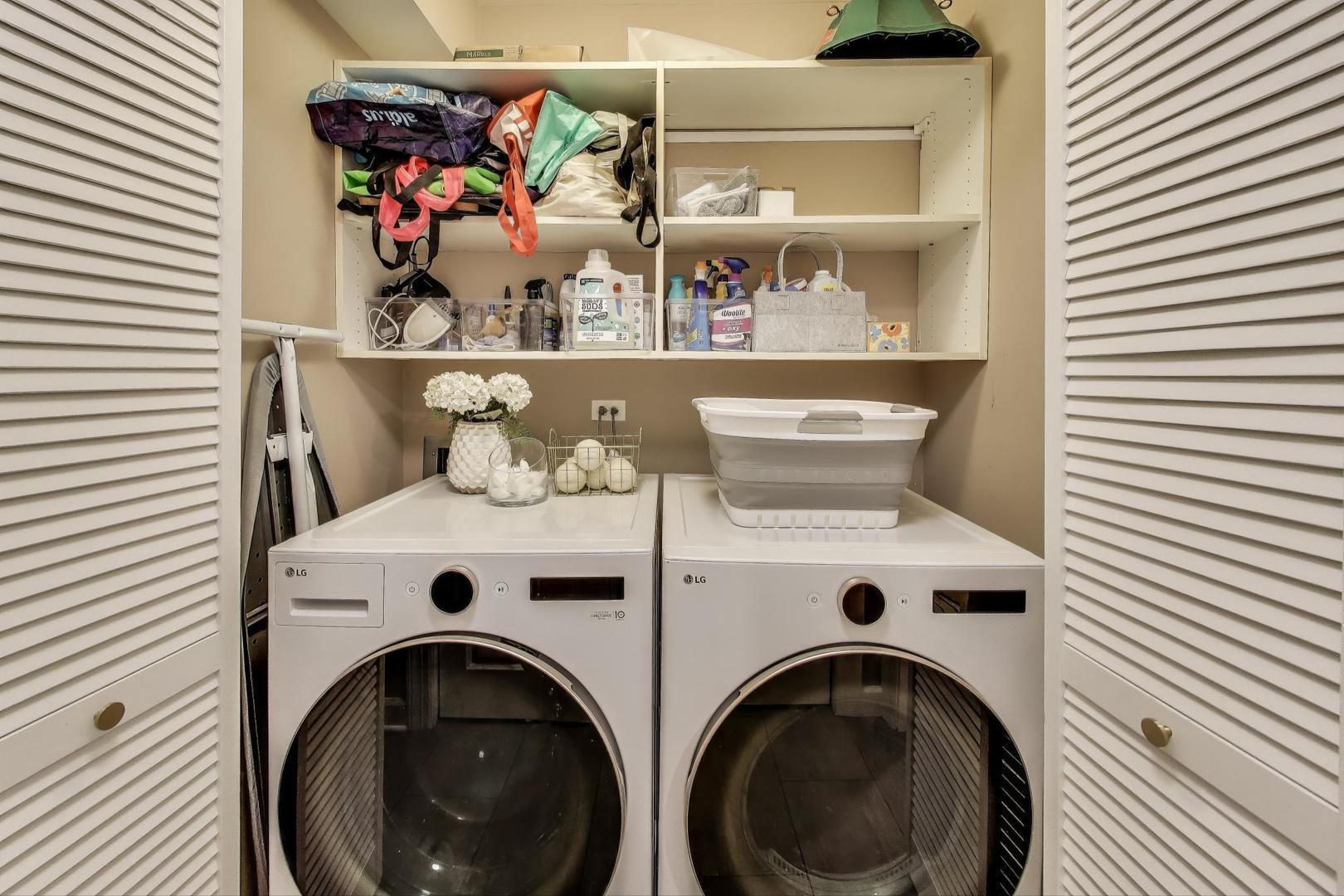 1533 North Cleveland Avenue, Unit 1S Chicago, IL 60610 - Photo 36 of 36 a utility room with dryer and washer
