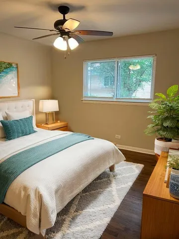 a bedroom with a bed and window