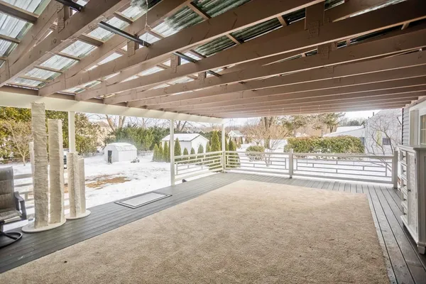 a view of a room with wooden walls