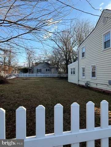 a front view of a house with lake view