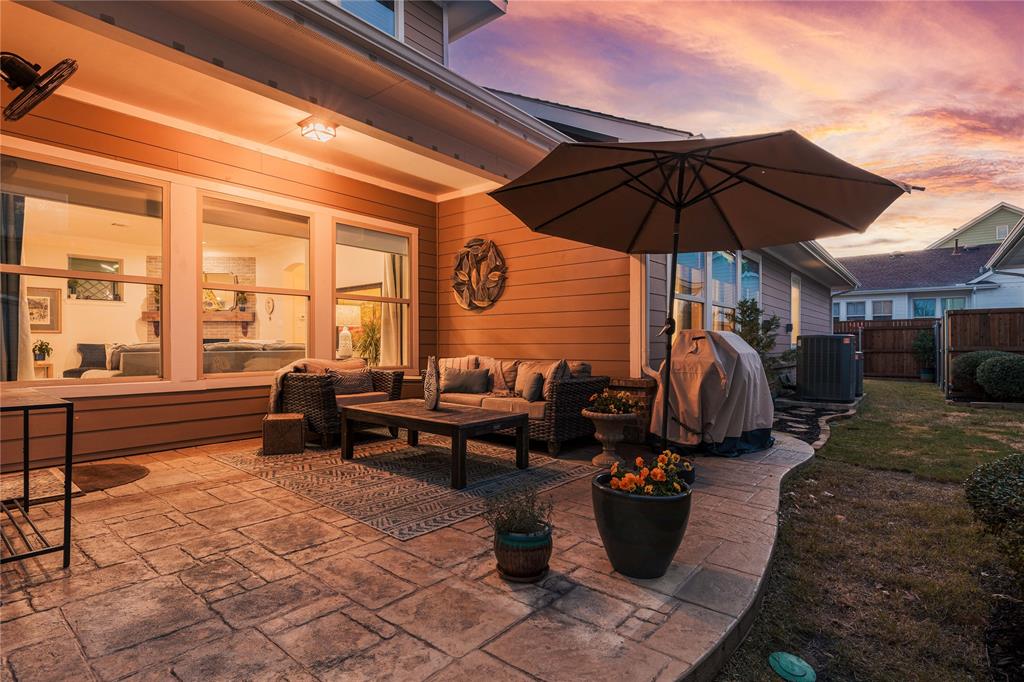 2205 State Boulevard McKinney, TX 75071 - Photo 25 of 40 Patio terrace at dusk with grilling area, a patio area, and outdoor lounge area