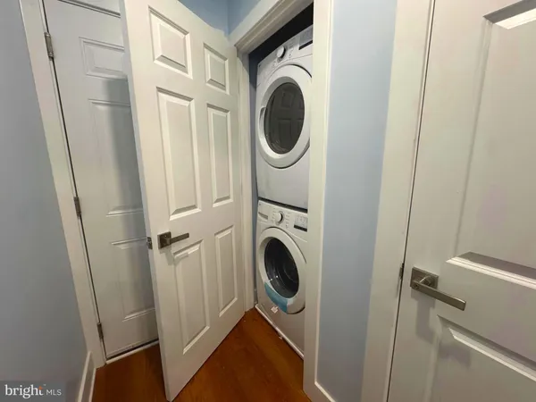 a bathroom with a sink toilet a mirror and shower