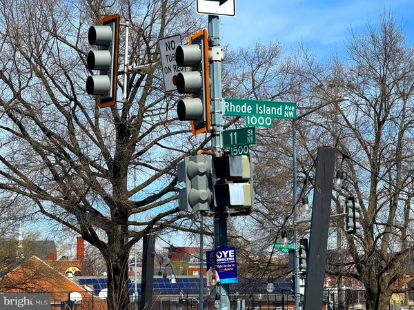 a view of balcony with furniture