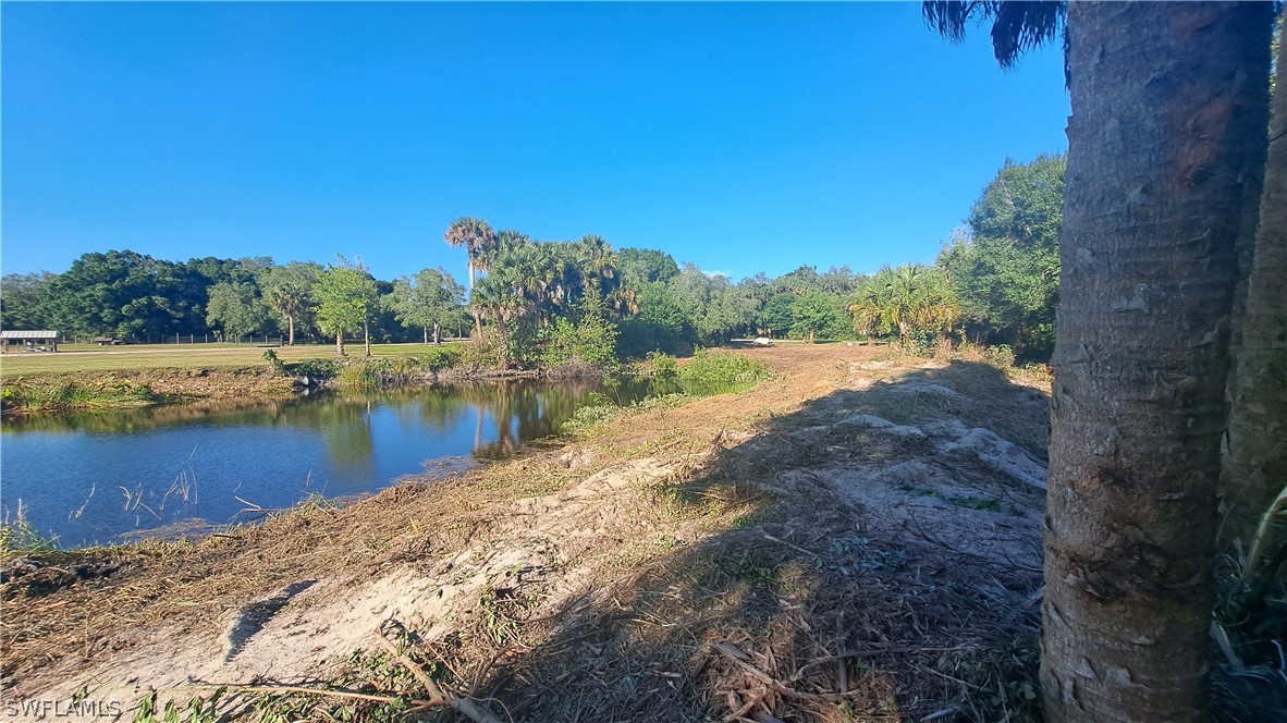 Derby Lane Moore Haven, FL 33471 - Photo 15 of 20 a view of lake with green space