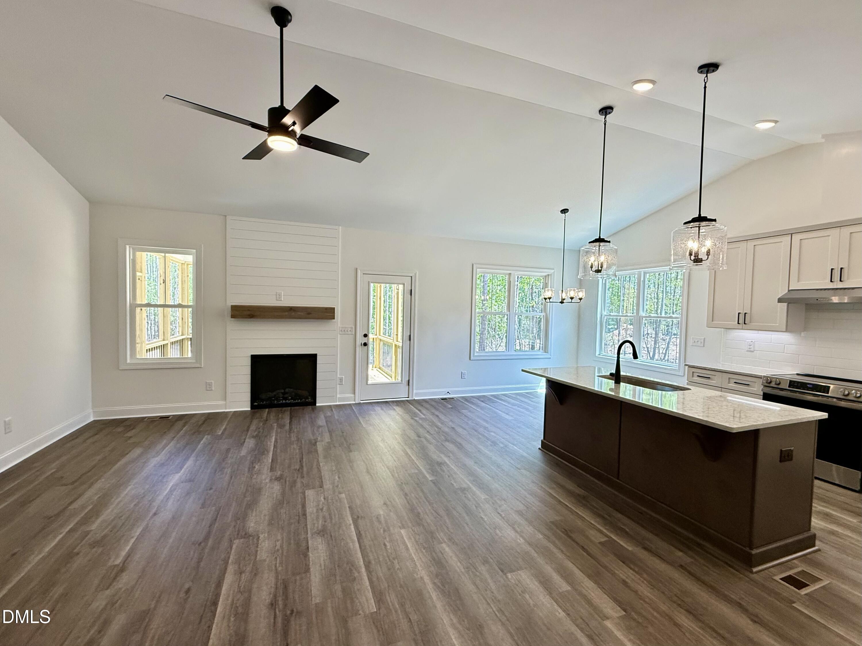 10300 Stallings Road Spring Hope, NC 27882 - Photo 12 of 36 a view of kitchen with sink microwave and stove