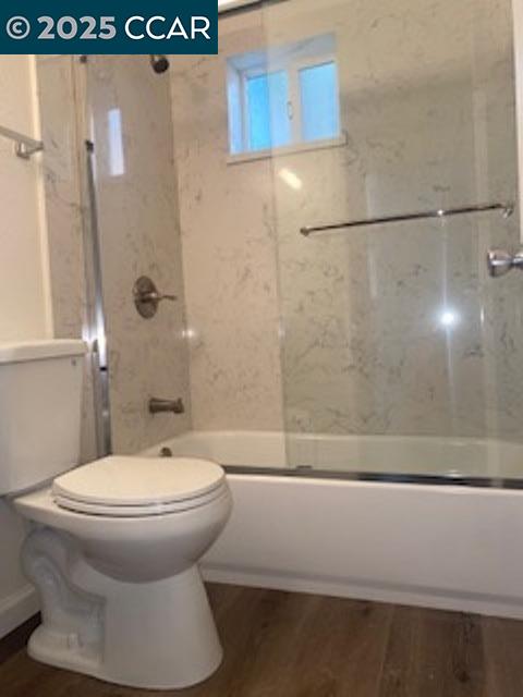 527 Vaqueros Avenue, Unit C Rodeo, CA 94572 - Photo 8 of 9 a bathroom with a sink and toilet