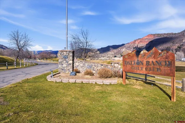 a view of a swimming pool with an ocean view