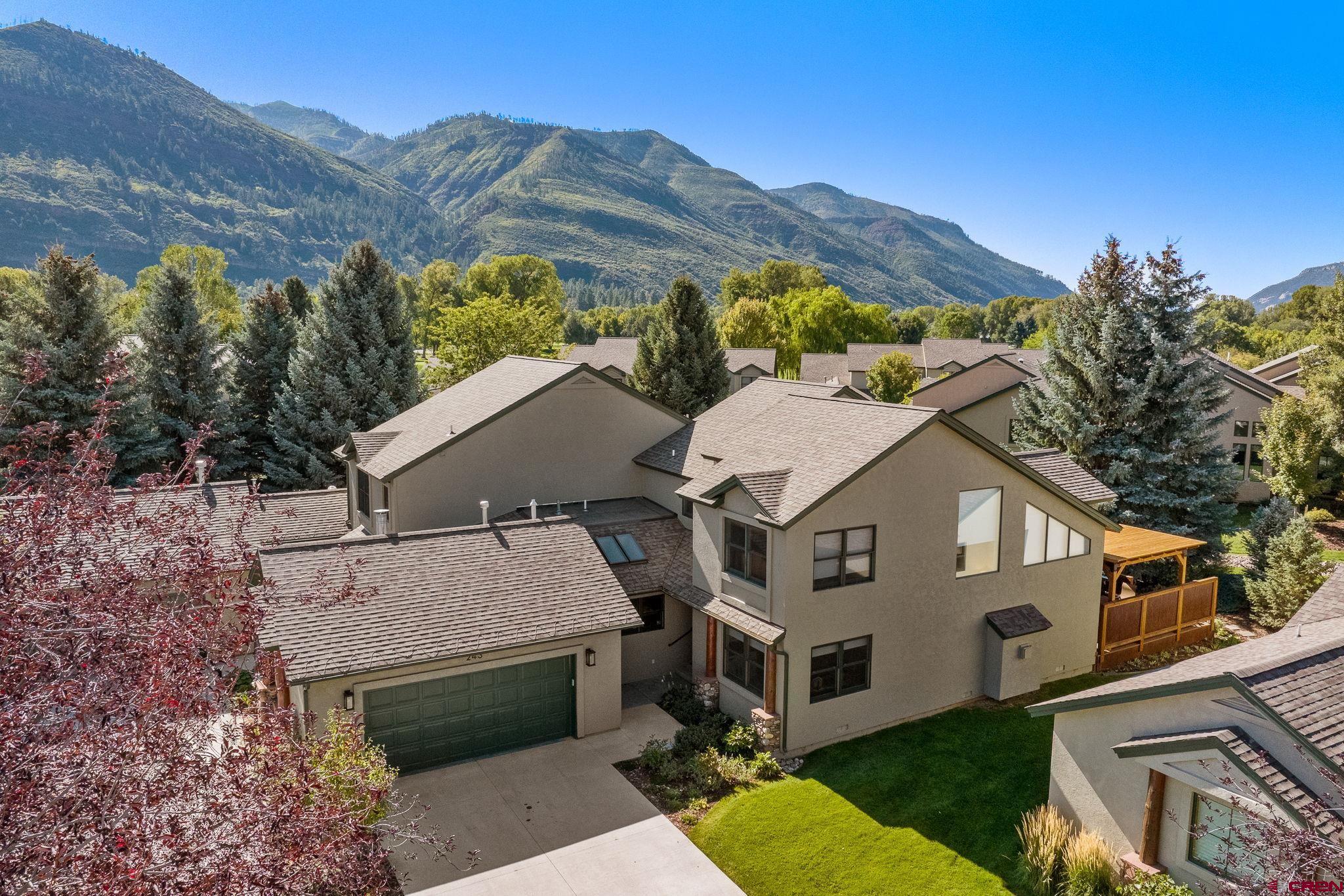 243 Cypress Court Durango, CO 81301 - Photo 39 of 42 a aerial view of a house next to a big yard