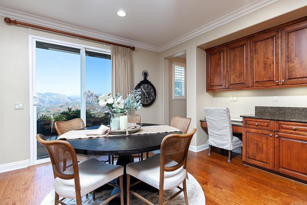 7231 Ocotillo Street Santee, CA 92071 - Photo 17 of 59 a view of a dining room with furniture window and wooden floor