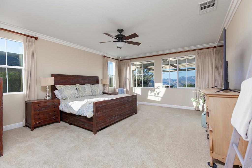 7231 Ocotillo Street Santee, CA 92071 - Photo 18 of 59 a living room with furniture and a fireplace
