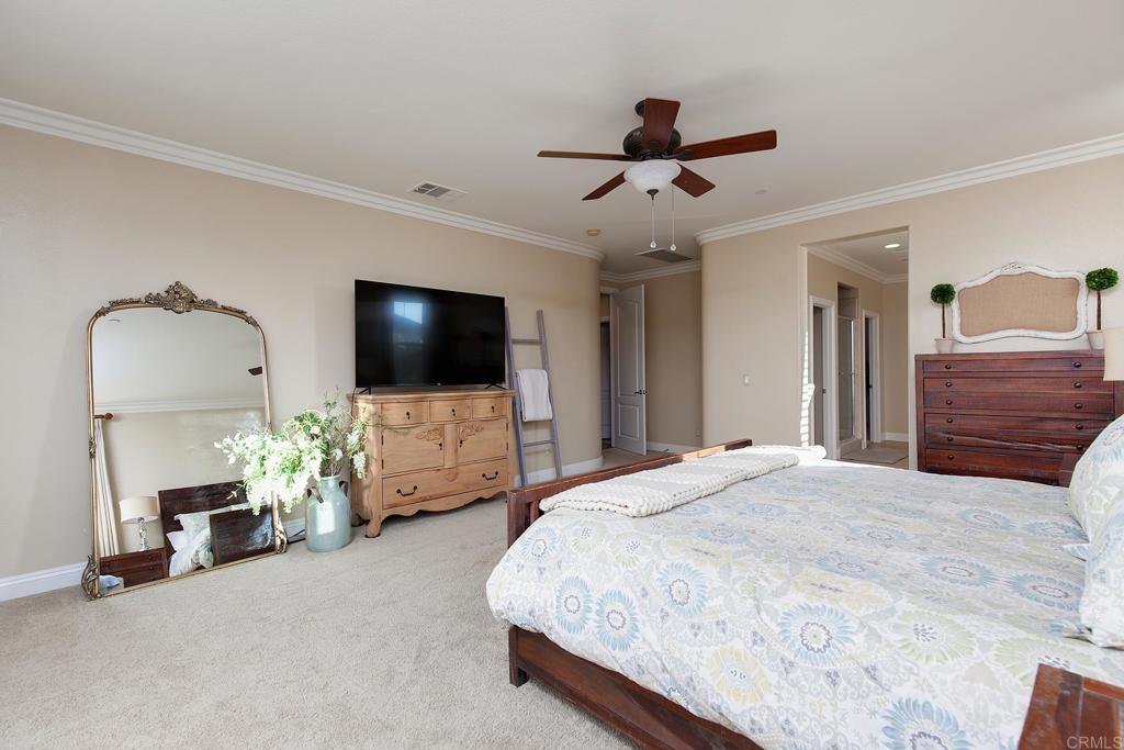 7231 Ocotillo Street Santee, CA 92071 - Photo 20 of 59 a bedroom with furniture and a flat screen tv