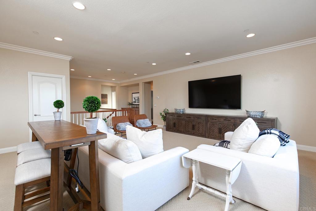 7231 Ocotillo Street Santee, CA 92071 - Photo 30 of 59 a living room with furniture and a flat screen tv
