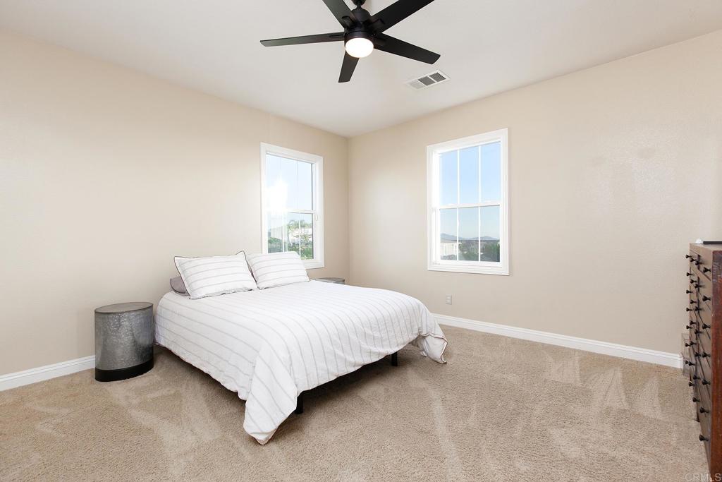 7231 Ocotillo Street Santee, CA 92071 - Photo 32 of 59 a bedroom with a bed and window