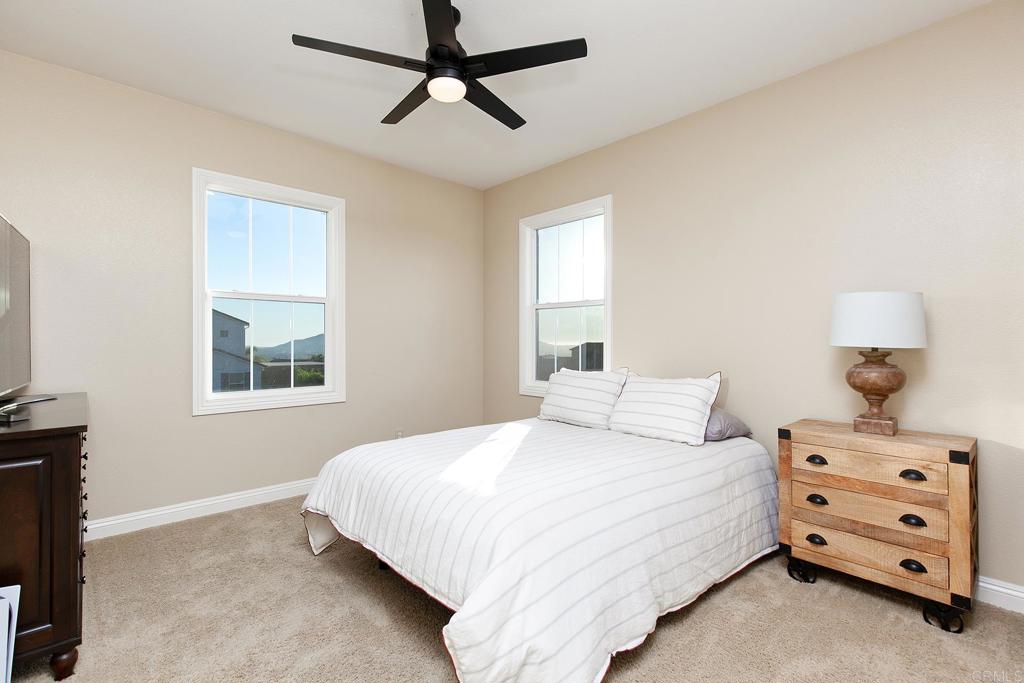 7231 Ocotillo Street Santee, CA 92071 - Photo 33 of 59 a bedroom with a bed and a window