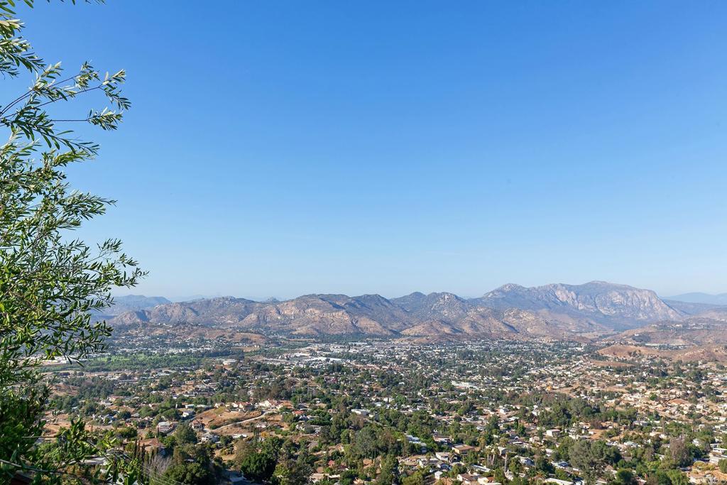 7231 Ocotillo Street Santee, CA 92071 - Photo 49 of 59 an aerial view of a house with a yard and mountain view in back