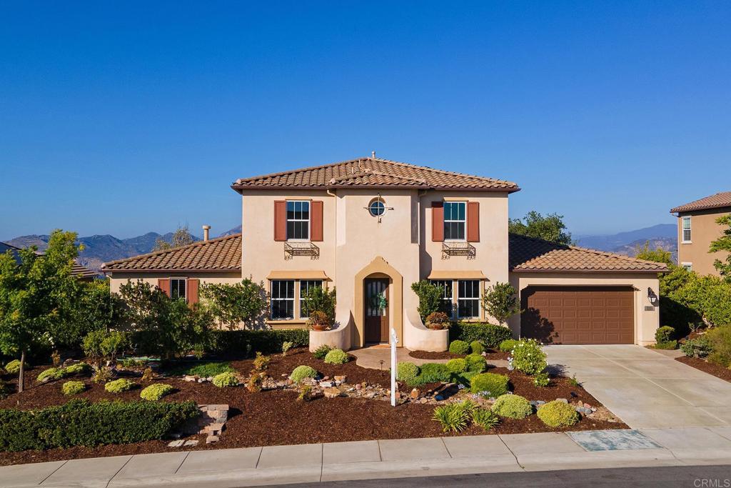 7231 Ocotillo Street Santee, CA 92071 - Photo 54 of 59 a front view of a house with garden