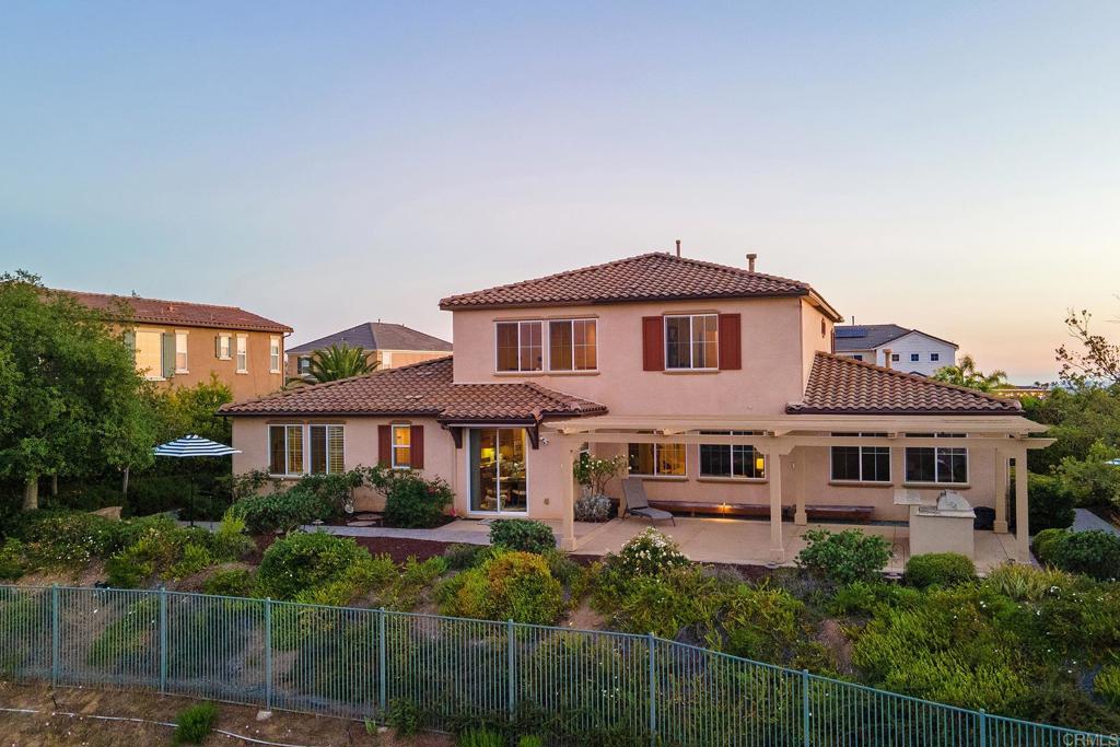 7231 Ocotillo Street Santee, CA 92071 - Photo 56 of 59 a front view of a house with a yard