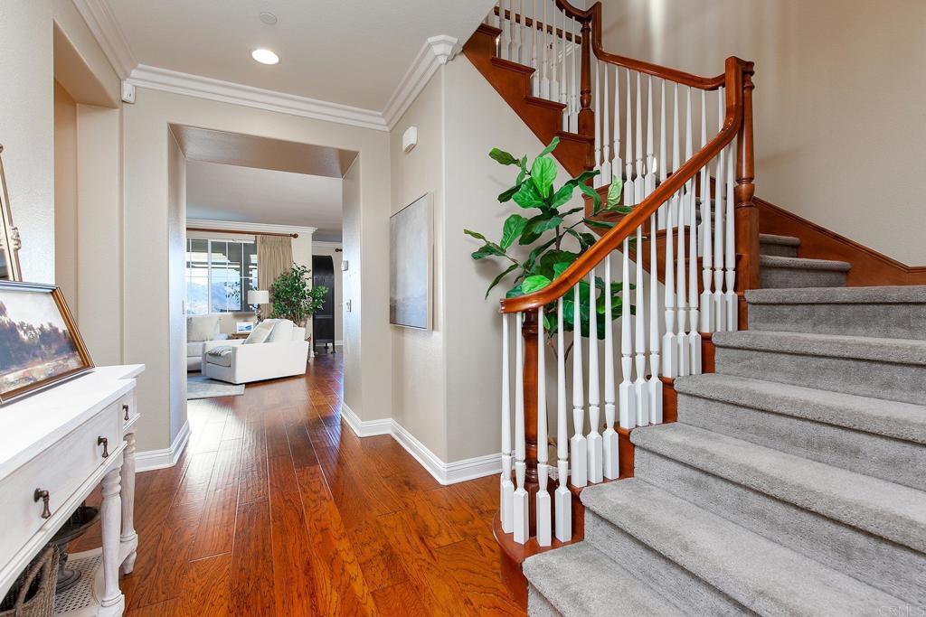 7231 Ocotillo Street Santee, CA 92071 - Photo 6 of 59 a view of entryway and hall with wooden floor