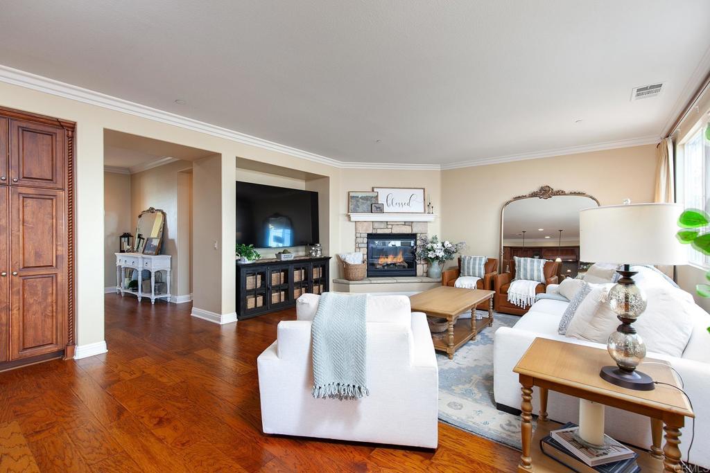 7231 Ocotillo Street Santee, CA 92071 - Photo 10 of 59 a living room with furniture and a flat screen tv
