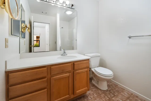 a bathroom with a sink and a toilet