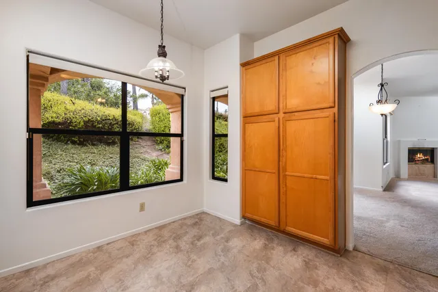 a view of a room with a large window