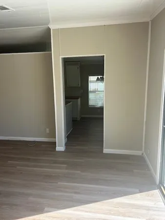 a view of livingroom with wooden floor