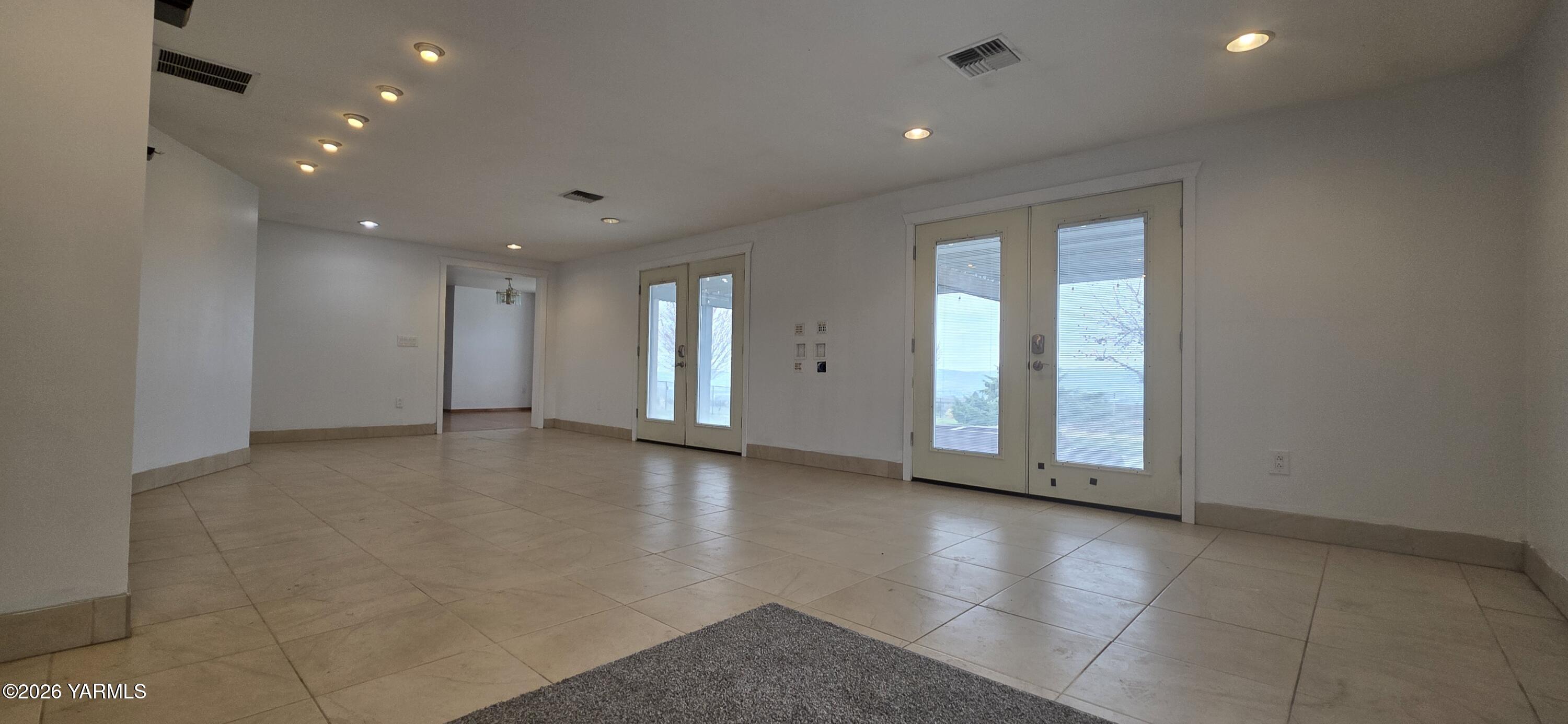 8601 Scenic Drive Yakima, WA 98908 - Photo 26 of 52 a view of an empty room with glass door
