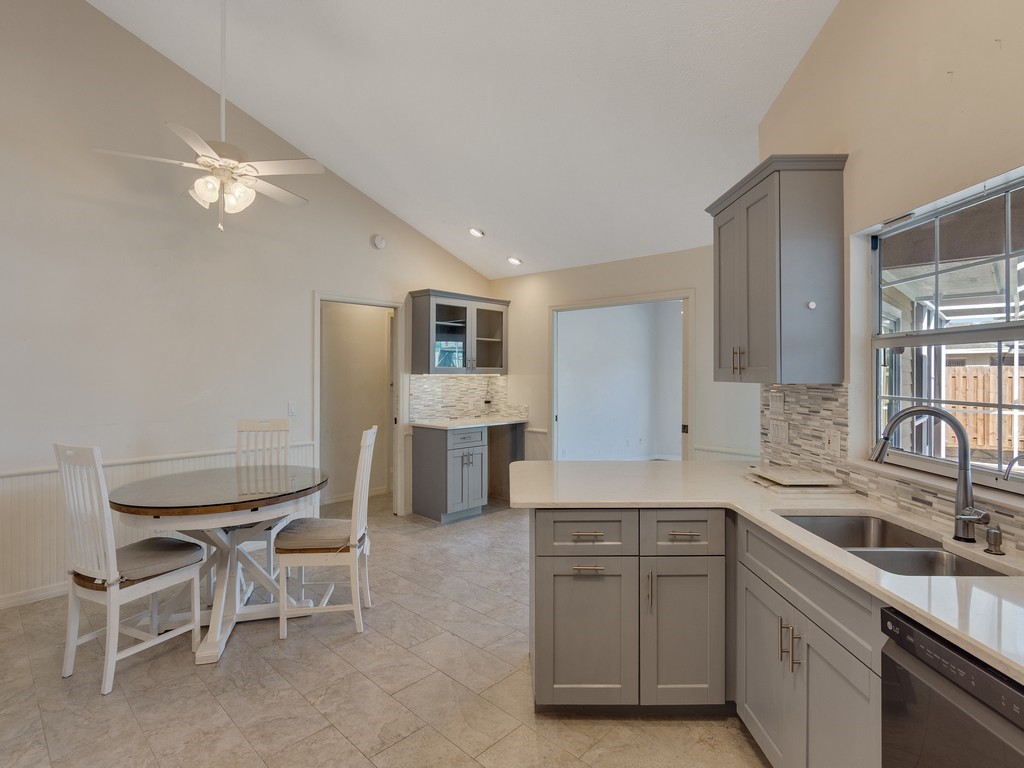 470 10th Place Southwest Vero Beach, FL 32962 - Photo 11 of 36 a kitchen with a sink cabinets and window