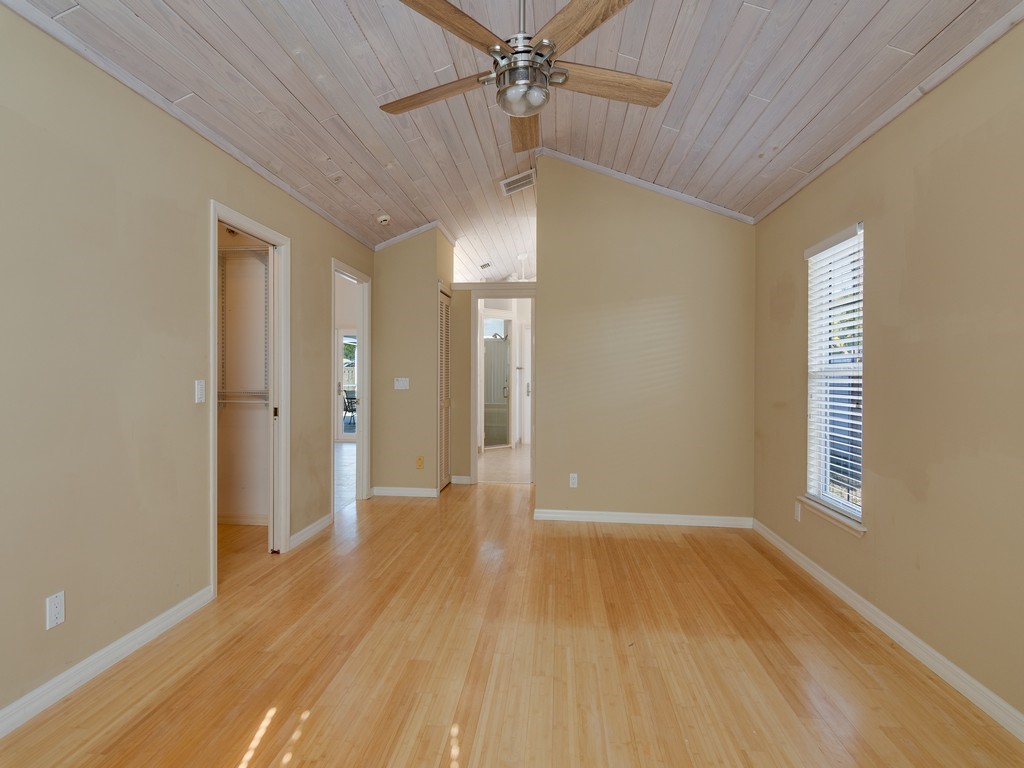 470 10th Place Southwest Vero Beach, FL 32962 - Photo 17 of 36 wooden floor in an empty room with a window