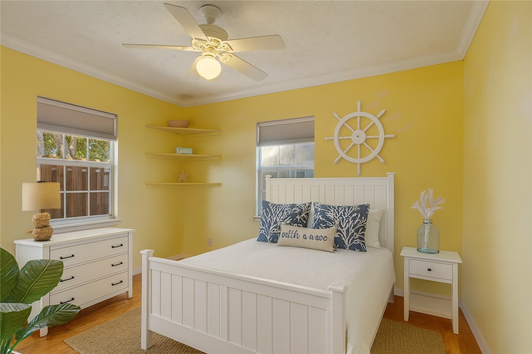 470 10th Place Southwest Vero Beach, FL 32962 - Photo 23 of 36 a bedroom with a bed and a window