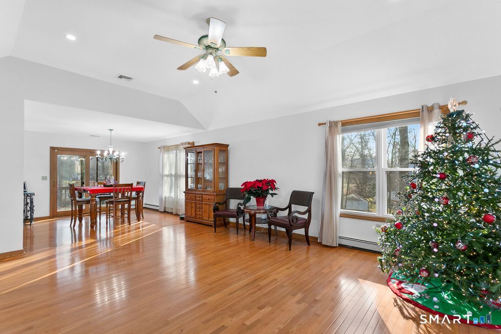 6 Stonegate Lane Shelton, CT 06484 - Photo 15 of 37 a living room with furniture and a large window