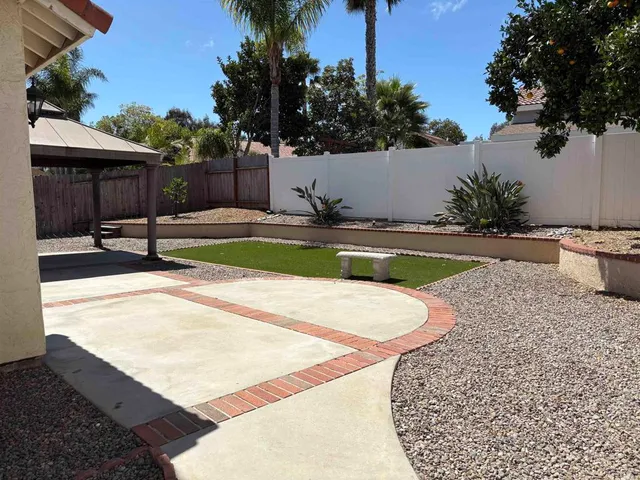 a view of swimming pool with seating space