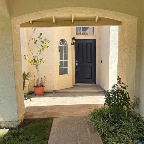 a view of a entryway door of the house