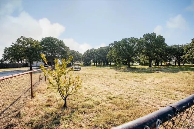 a view of swimming pool with an outdoor seating