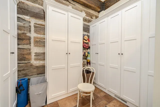 a bathroom with a shower and a toilet