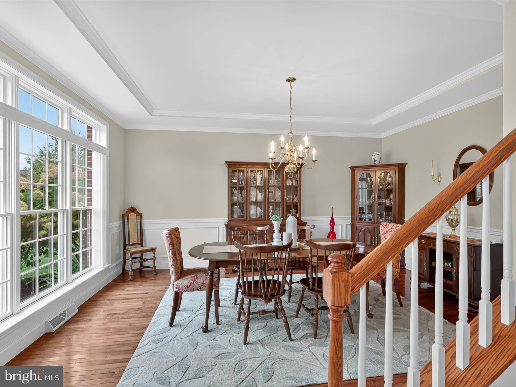 213 Barkay Crossing Lititz, PA 17543 - Photo 23 of 112 a view of a dining room with furniture window and wooden floor