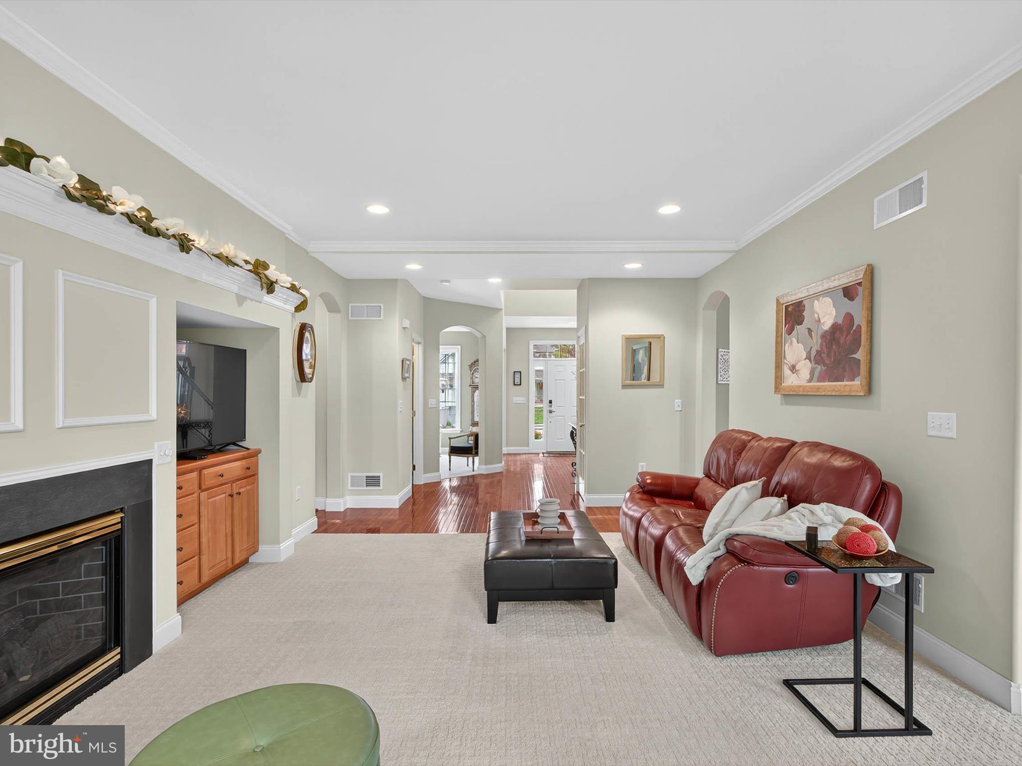 213 Barkay Crossing Lititz, PA 17543 - Photo 39 of 112 a living room with furniture and a fireplace